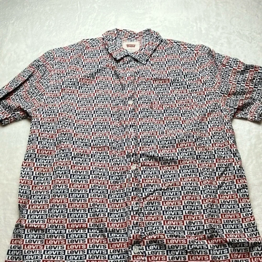 Levi's button down shirt. Mens Small Red, white and blue.